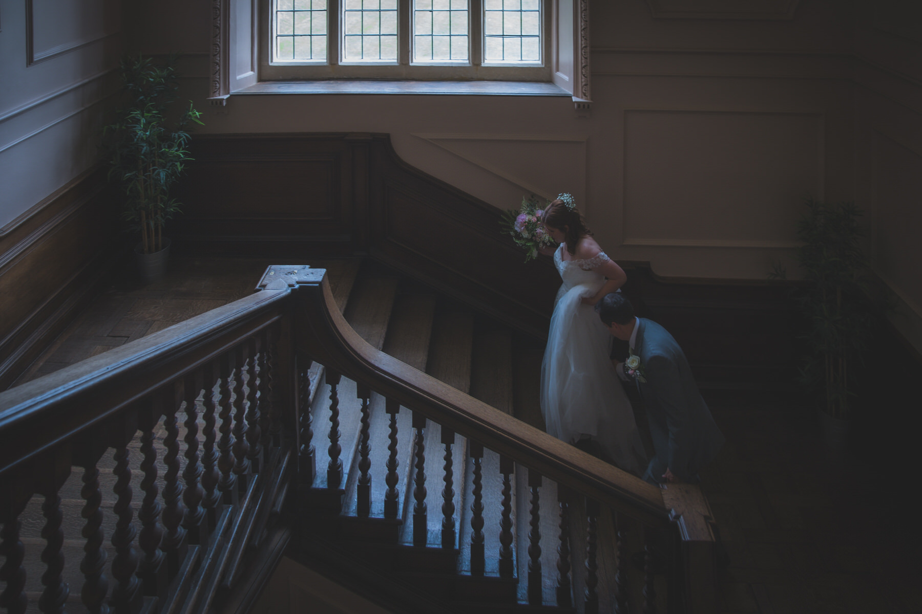 Wedding Couple on staircase Shaw House Newbury